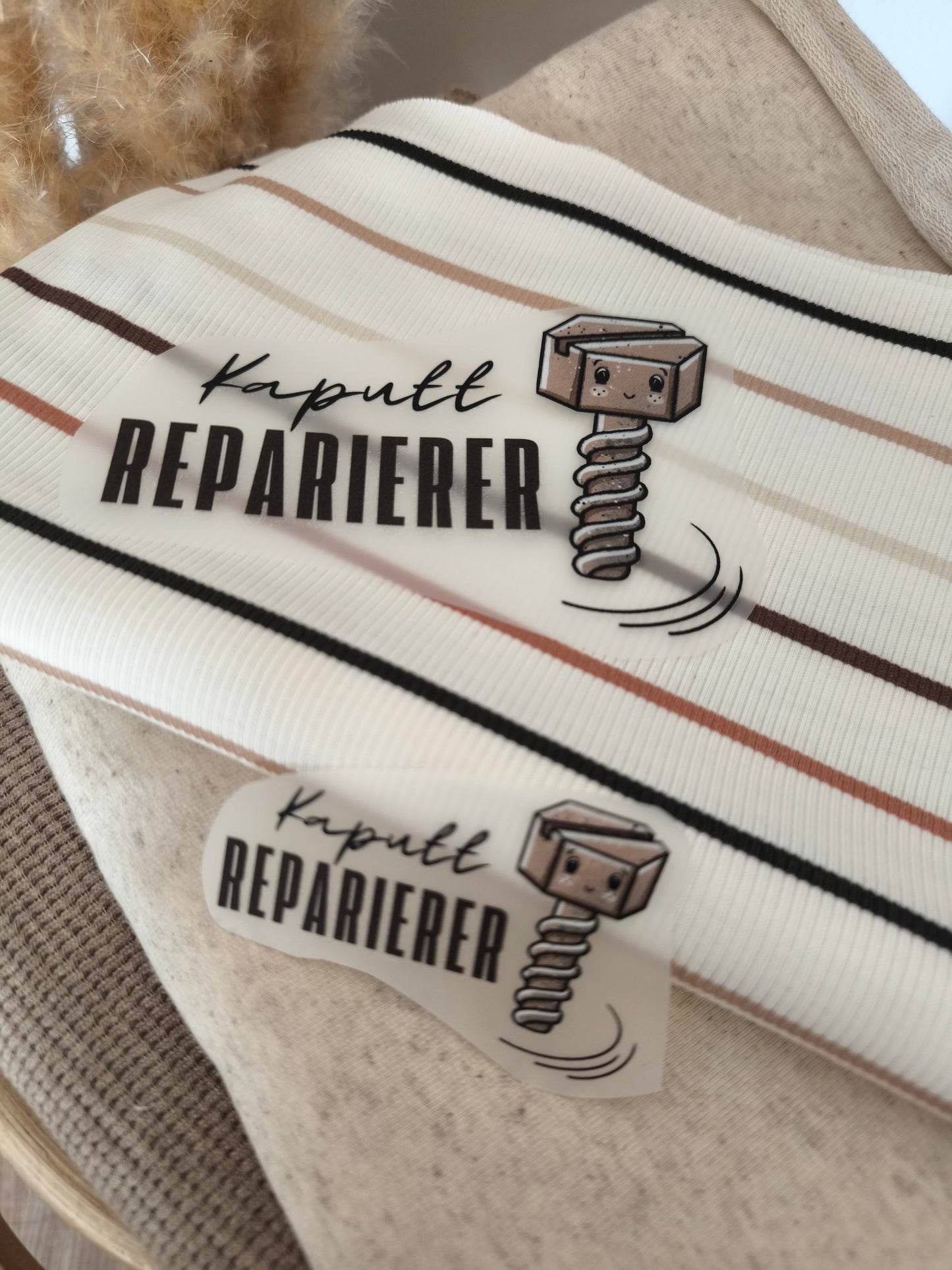 Bügelbild "Kaputt Reparierer" Schraube