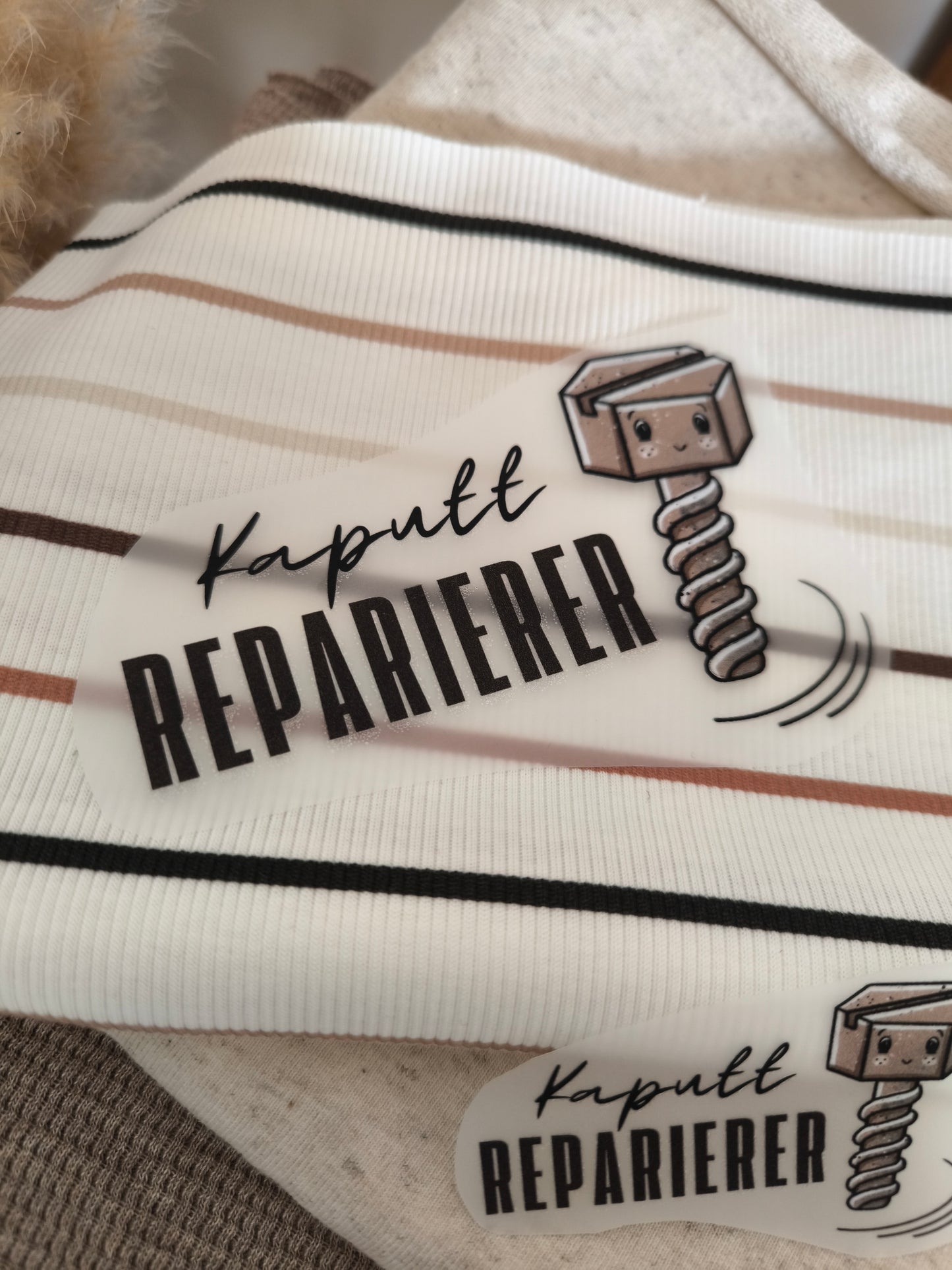 Bügelbild "Kaputt Reparierer" Schraube